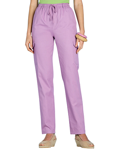 A pair of bright pink trousers, worn three ways - No Fear of Fashion
